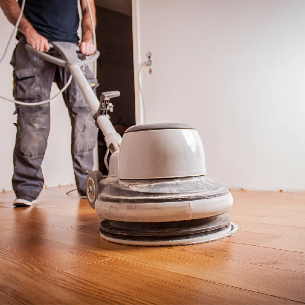 large floor buffer or sander on a hardwood floor.